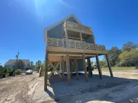 New in 2024 Carova Beach Canal Front Home!! 4X4 Required