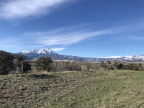 Cheerful two-story,  4-bedroom family home.  Whole house HVAC system! Hotels in Huerfano County