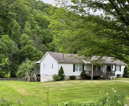 Secluded 3 bedroom home with creek in the back yard