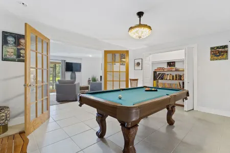 Twin Palms - water views! close to downtown Ocean Springs! With game room & dock