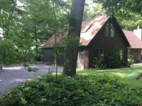 A   warm relaxing  couples retreat  with all the  comforts of home .