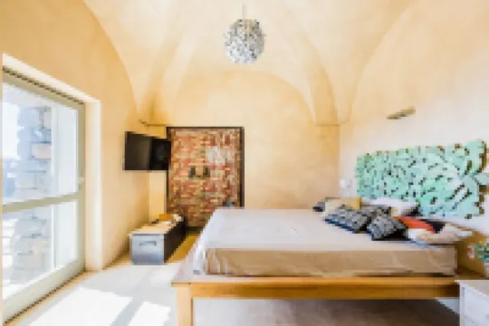 New structure with 3 dammusi, infinity pool and breathtaking sea view Hôtels à : Pantelleria