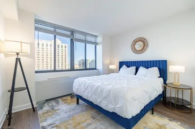 Chic Highrise 2BR King Bed Deluxe Escape Pool l GYM l Balcony Near DC/Metro/Mall Hotels in 
