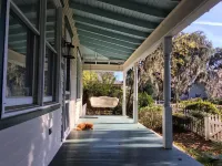 Charming bungalow with wraparound porch in Thunderbolt Hotels in Thunderbolt