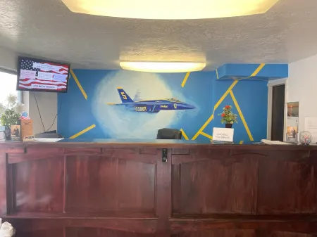 Patriot Stay Motel Отели в г. Нейплс