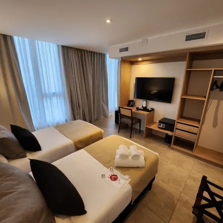 Amerian Rio Cuarto Apart & Suites Отели в г. Рио-Куарто