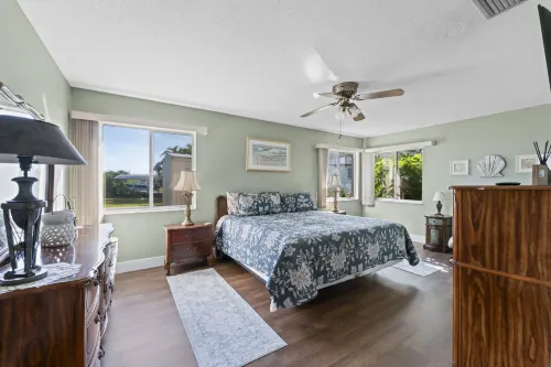 Screened Porch with Canal View and Games - Charming Vintage Oasis