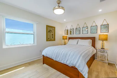 Bright Interiors and Steps to the Beach - Charming Coastal Haven