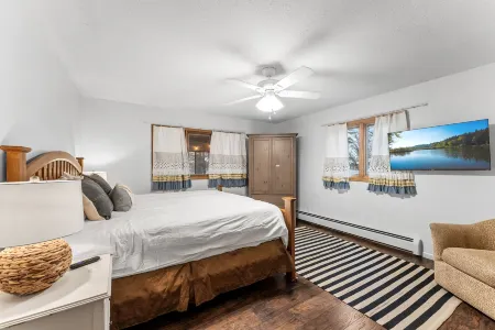 Lakeside Retreat with Canoe and Fire Pit - Inviting Tranquil Haven