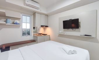 Warm and Cozy Style Studio Room at Paltrow City Apartment