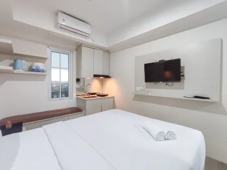 Warm and Cozy Style Studio Room at Paltrow City Apartment