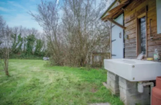 The Pod - Freshwest Beach Retreat的一間卧室 酒店