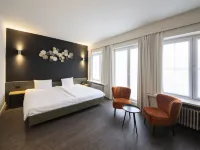 Hotel Cortina Отели рядом с достопримечательностью «Башни Броэль»