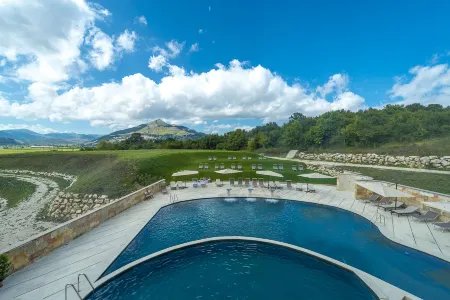 Aqua Montis Resort & Spa Отели рядом с достопримечательностью «Parco Divertimenti Coppo dell'Orso»