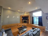 Lake Front home Sleeps 10 Overlooking deck for perfect lake views & a coffee bar