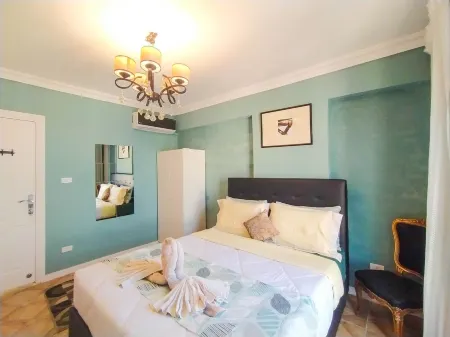 FREE AIRPORT PICK UP beautiful sea view Apt,in the heart of Alexandria Отели рядом с достопримечательностью «Eliahu Hanady Synagogue»