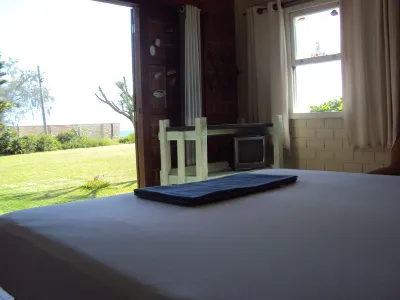 Thinking about staying by the sea? Full Moon Address. Hotel in zona Lagoinha do Leste