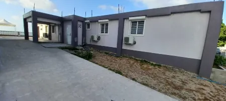 Novels Villa is Family friendly home with the Caribbean Sea as your backyard Отели в г. Горанд-Кейс