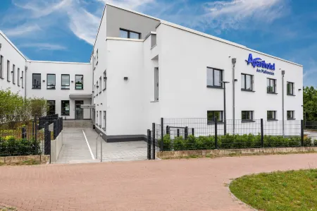 Aparthotel am Pfaffenstein Отели в г. Клайн-Винтернхайм