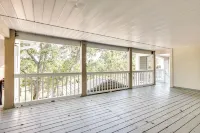 Coastal Condo w/ Screened Deck + Community Pool - balcony
