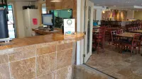 The Amethyst Beach Motel - Parkplatz