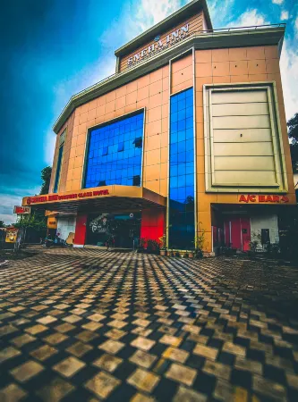 Sneha Inn Отели рядом с достопримечательностью «Uchatthu Kayam Riverside Picnic Spot»