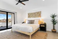 Bocce PoolSpa Game Room Firepit Modern Oasis Yucca Haven by AvantStay