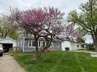 Charming 3-bedroom pet friendly house with fenced in yard in Clinton, IA.