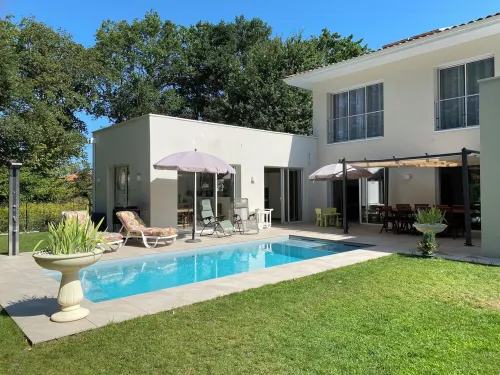 Modern house with swimming pool near the coast