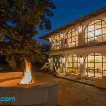 StayVista's Casa Blanca - Modern Elegance with a Pool, Spacious Lawn & Diverse Activities Hotel Exterior