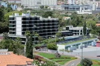 Enotel Magnólia Hotels near Monte Palace Madeira