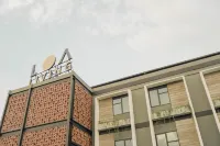 Loa Living Solo Baru Hotel dekat The Park Mall Solo Baru