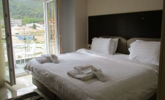 Kyknos de Luxe Suites & Rooms