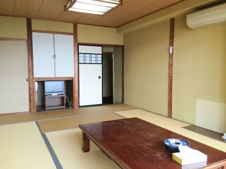 Suzukiya Ryokan Отели в г. Нисио
