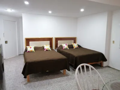 Suite 29 Twin Towers Hotels near Tienda 3B