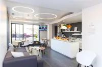 Hôtel les Voiles - servizio colazione