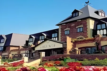 Village Hotel Wirral Отели в г. Хесуолл