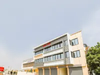 StayGuru Hotel Atithi - Airport Shuttle