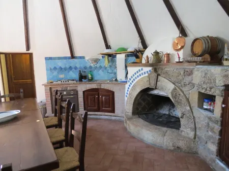 House in the Countryside surrounded by greenery at the foot of the supramonte