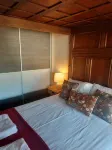 Whitewashed 1 bedroom stone cottage, with king size 4 poster bed. Pet friendly.
