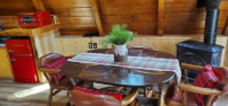 Private lakeside A-frame cabin w/ hot tub, beach, docks, games... 4 season fun!