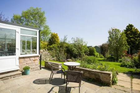 Cosy cottage with delightful private garden and summerhouse.