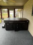 This charming  cozy cottage has a private hot tub, deck for fishing.