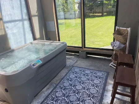 Newly remodeled 4 bedroom 3 bath house with giant fenced back yard and hot tub!