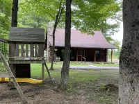 Beautiful log cabin with all the creature comforts of home. Private fishing lake