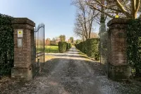 Renovated Grange in a Renaissance Villa Park