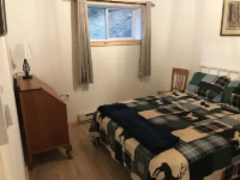 Secluded house with enclosed dog yard on 200 acre family estate