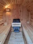 Vacation home with barrel sauna, fireplace and massage chair.
