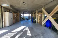 Beachfront 2-bedroom townhome, private beach access, outdoor space & amenities.