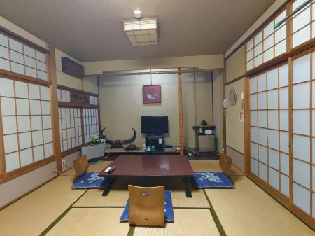 Tsutaya Ryokan Отели в г. Мицукэ